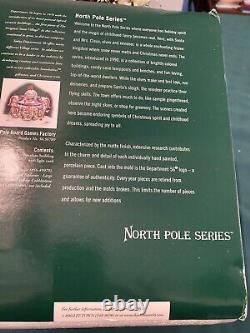 DEPT 56 NORTH POLE NORTH POLE BOARD GAMES FACTORY LIGHTED 2005 Retired