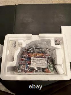 Department 56-North Pole- Hot Wheels Building 56784