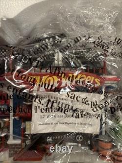 Department 56-North Pole- Hot Wheels Building 56784