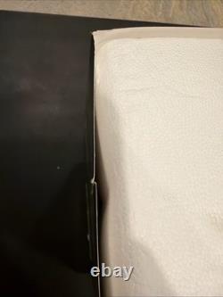 Department 56-North Pole- Hot Wheels Building 56784