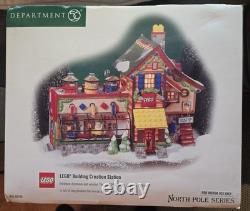 Department 56 North Pole Series Lego Christmas Village 4 Piece Collection