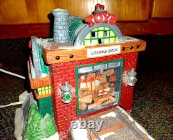 Department 56 North Pole Series Loading the Sleigh Christmas Village Set #52732