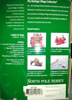 Department 56 North Pole Series Loading the Sleigh Christmas Village Set #52732