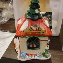 Department 56 North Pole Series The Jolly Fellow Toy Co. Porcelain 2013 Lighted