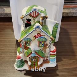 Department 56 North Pole Series Ugly Sweater Co. Illuminated Porcelain House 20