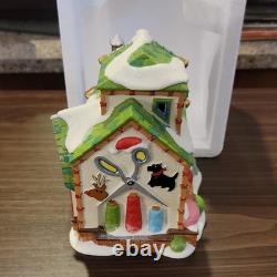 Department 56 North Pole Series Ugly Sweater Co. Illuminated Porcelain House 20