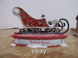 Dept. 56 2006 North Pole Santa's Sleigh Maker & Santa's New Sleigh Design