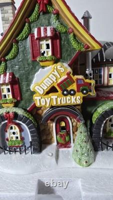Dept 56 NPS Dumpy's Toy Trucks 799915 Retired 2009 Mint, House, Lighted, NIOB
