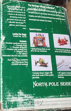 Dept 56 North Pole Series Loading The Sleigh, Heritage Village Collection