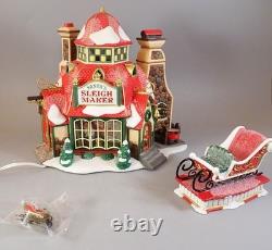 Dept 56 North Pole Series Santa's Sleigh Maker (Set of 2) 56.56950 Lighted