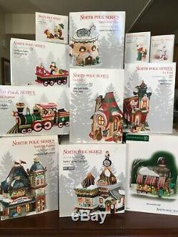 Dept. 56 North Pole Village 11 Piece Assortment 8 Buildings, 3 Accessories