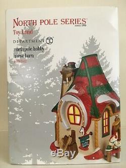 Dept. 56 North Pole Village 11 Piece Assortment 8 Buildings, 3 Accessories