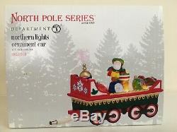 Dept. 56 North Pole Village 11 Piece Assortment 8 Buildings, 3 Accessories