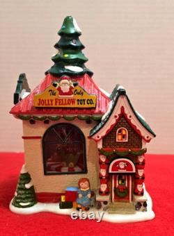 Dept 56 North Pole Village Jolly Fellow Toy Co 4035571 Mint Mint Missing 2 Flags