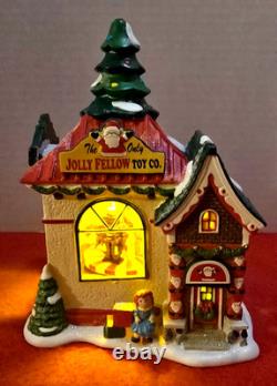 Dept 56 North Pole Village Jolly Fellow Toy Co 4035571 Mint Mint Missing 2 Flags