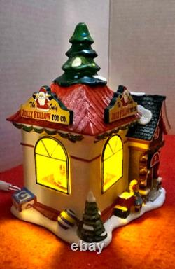 Dept 56 North Pole Village Jolly Fellow Toy Co 4035571 Mint Mint Missing 2 Flags