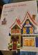Disney Department 56 North Pole Village Mickey's Pin Traders Lighted House & Pin