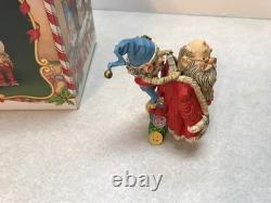 Enesco North Pole Village. Seamer With Santa