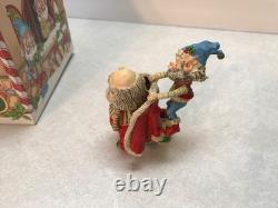 Enesco North Pole Village. Seamer With Santa