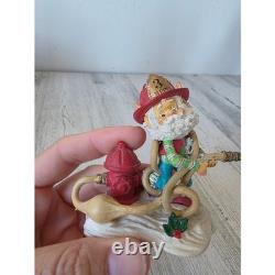 Enesco sandi zimnicki squirt North Pole village elf firefighter fire hydrant