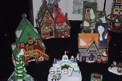 Huge lot of Christmas Village Dept 56 North Pole Collection with accessories +more