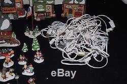 Huge lot of Christmas Village Dept 56 North Pole Collection with accessories +more