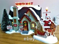 The North Pole House Department 56 6005449 Snow Village Christmas Lane Set of 2