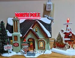 The North Pole House Department 56 6005449 Snow Village Christmas Lane Set of 2